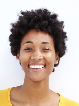 closeup-of-a-smiling-young-black-woman-PJGUSWC.jpg